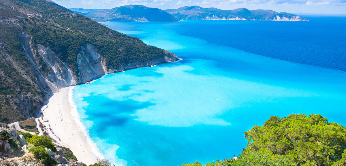 Embark on a breathtaking day trip to Myrtos Beach in Kefalonia, Greece. Witness the iconic beauty of one of the world's most stunning beaches, characterized by its pristine white pebbles and crystal-clear turquoise waters. Relax on the soft sand, soak up the sun, and take in the awe-inspiring views of the dramatic cliffs and the vast Ionian Sea. A visit to Myrtos Beach promises an unforgettable experience and a true highlight of your Kefalonia adventure