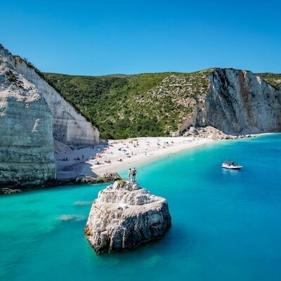Dive into the stunning beaches of Kefalonia, Greece, with our comprehensive guide. Explore the island's pristine shores, from the iconic Myrtos Beach with its crystal-clear turquoise waters to the secluded beauty of Antisamos Beach. Discover hidden gems like Petani Beach, Xi Beach, and Skala Beach, each offering its own unique charm. Whether you seek soft sandy stretches or pebbly coves, bustling beachfronts or tranquil hideaways, our guide will help you find the perfect spot to soak up the sun, swim in the azure sea, and unwind in the captivating coastal beauty of Kefalonia