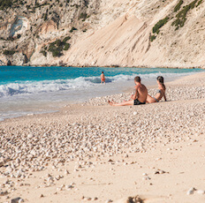 An enchanting portrayal of romantic day trips in Kefalonia, Greece, where couples create cherished memories amidst idyllic settings, embracing the beauty of nature, and indulging in intimate moments together.